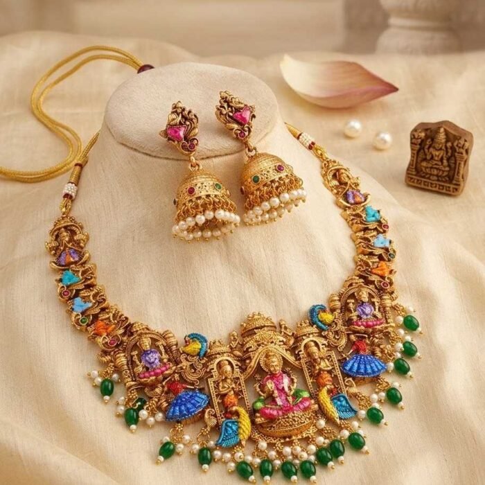 Aadhya Antique Gold Temple Jewellery Set Aadhya Antique Gold Temple Jewellery Set with Meenakari Art & Pearl Droplets